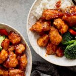 Sweet and savory chicken teriyaki bowls with fresh broccoli, red bell peppers, and steamed rice, perfect for a quick and healthy Asian-inspired meal.