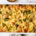 Creamy broccoli and mushroom casserole baked with cheese in a white dish, served as a delicious comfort food or family dinner. Perfect for vegetable lovers and easy to prepare.