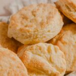 Golden baked scones with a flaky, buttery texture, perfect for breakfast or tea time. These homemade scones are soft inside with a crisp exterior, ideal for serving with jam or butter.