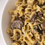 Savory beef and mushroom pasta in a creamy sauce with tender egg pasta, perfect for a hearty meal.