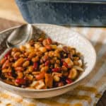 Sweet and savory seven-bean salad in a decorative bowl, perfect for healthy eating and meal prep.