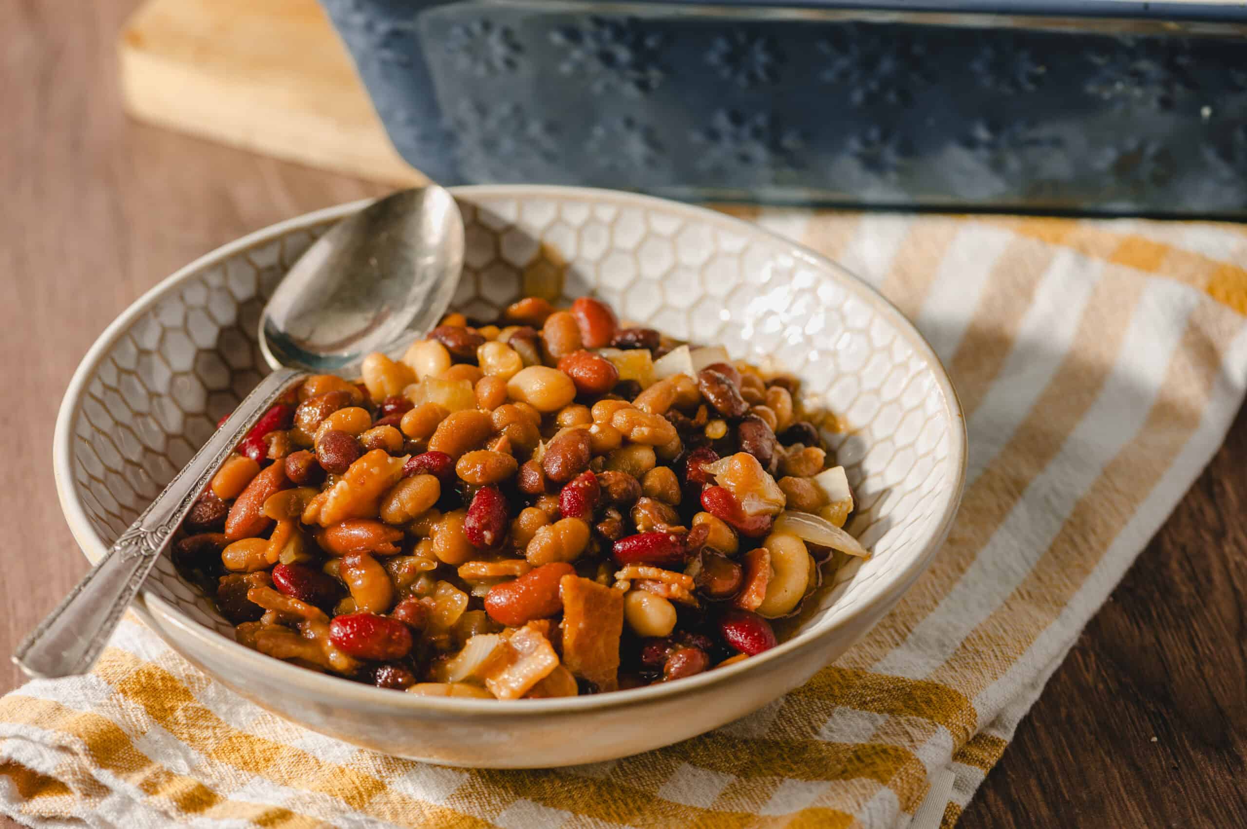 Sweet and savory seven-bean salad in a decorative bowl, perfect for healthy eating and meal prep.