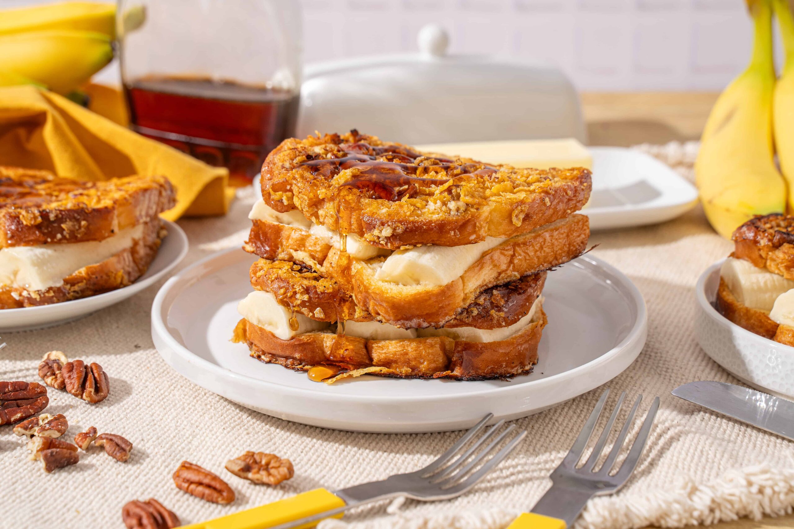 Butterscotch Bread Pudding with Pecans; rich dessert featuring bread soaked in custard topped with butterscotch sauce and pecans, served warm for a delicious treat.