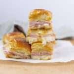 Savory ham and cheese breakfast casserole squares with a golden, crispy crust perfect for brunch or breakfast recipes.