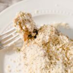 Creamy chicken casserole with a breadcrumb topping on a white plate, served with a fork, showcasing a comforting and delicious dish perfect for family dinners and easy weeknight meals.