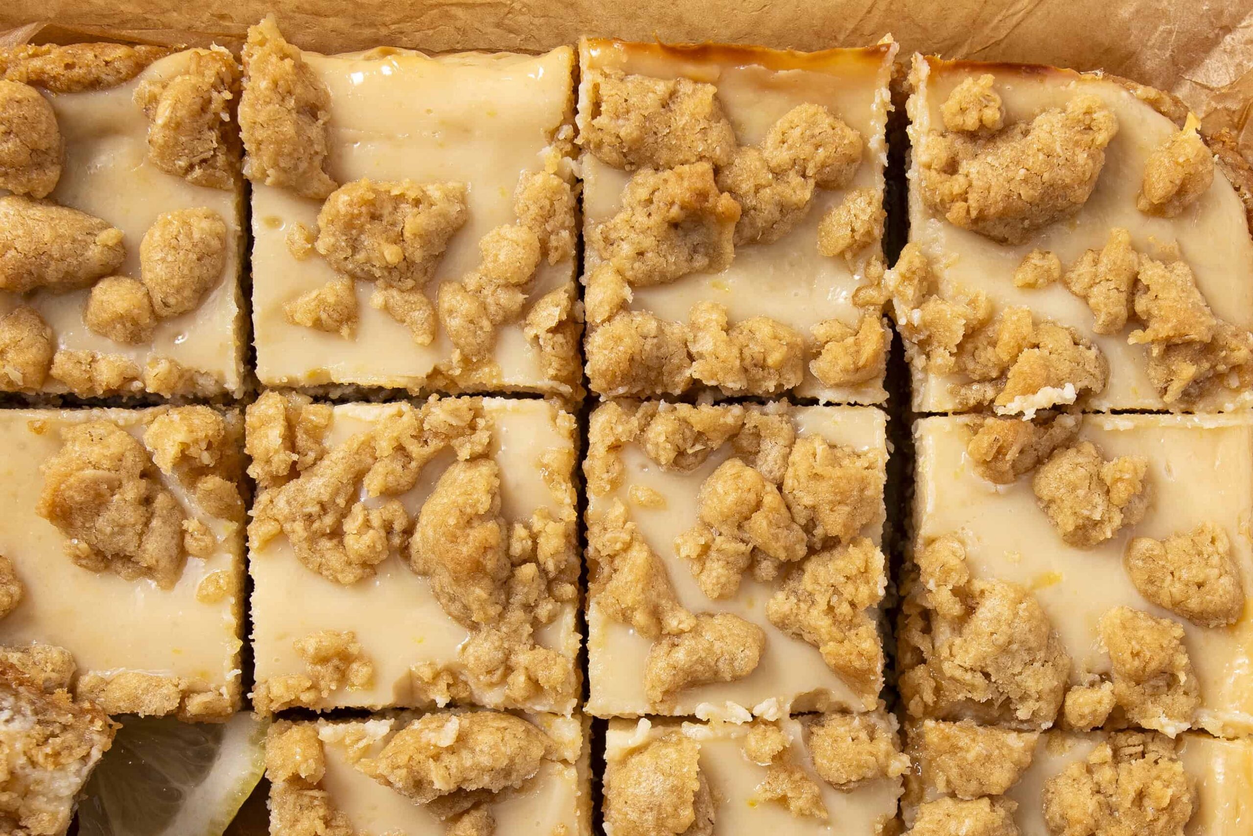 Golden crumb-topped lemon bars with creamy filling and crumbly streusel texture, perfect for dessert or afternoon snack. A delicious and visually appealing treat from Hey Recipe.