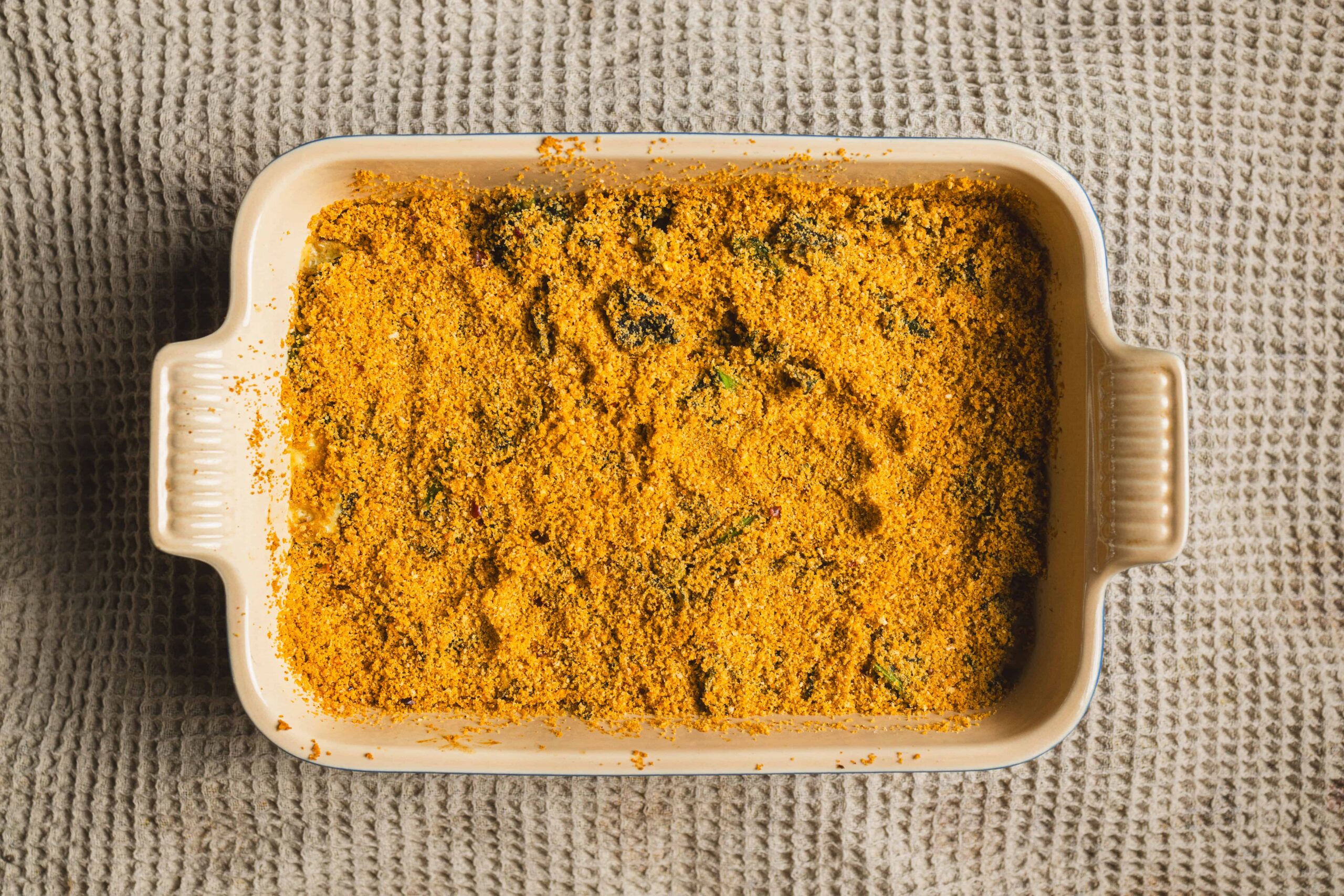 Golden baked casserole topped with crunchy breadcrumb crust, perfect for comfort food and family dinners.